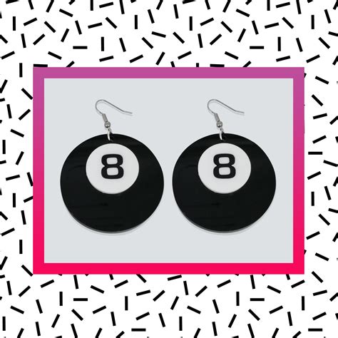 Embrace the whimsy with Magic 8 ball earrings